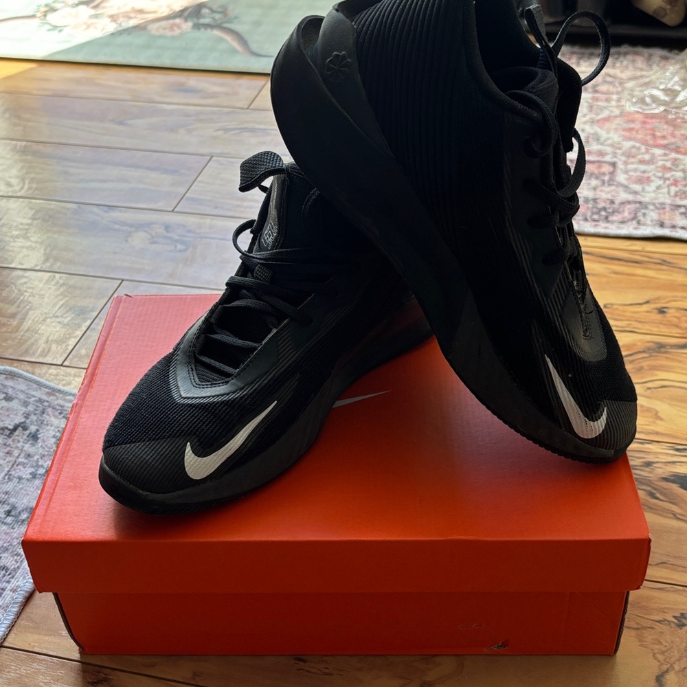 Nike Black Athletic Shoes with White Swoosh